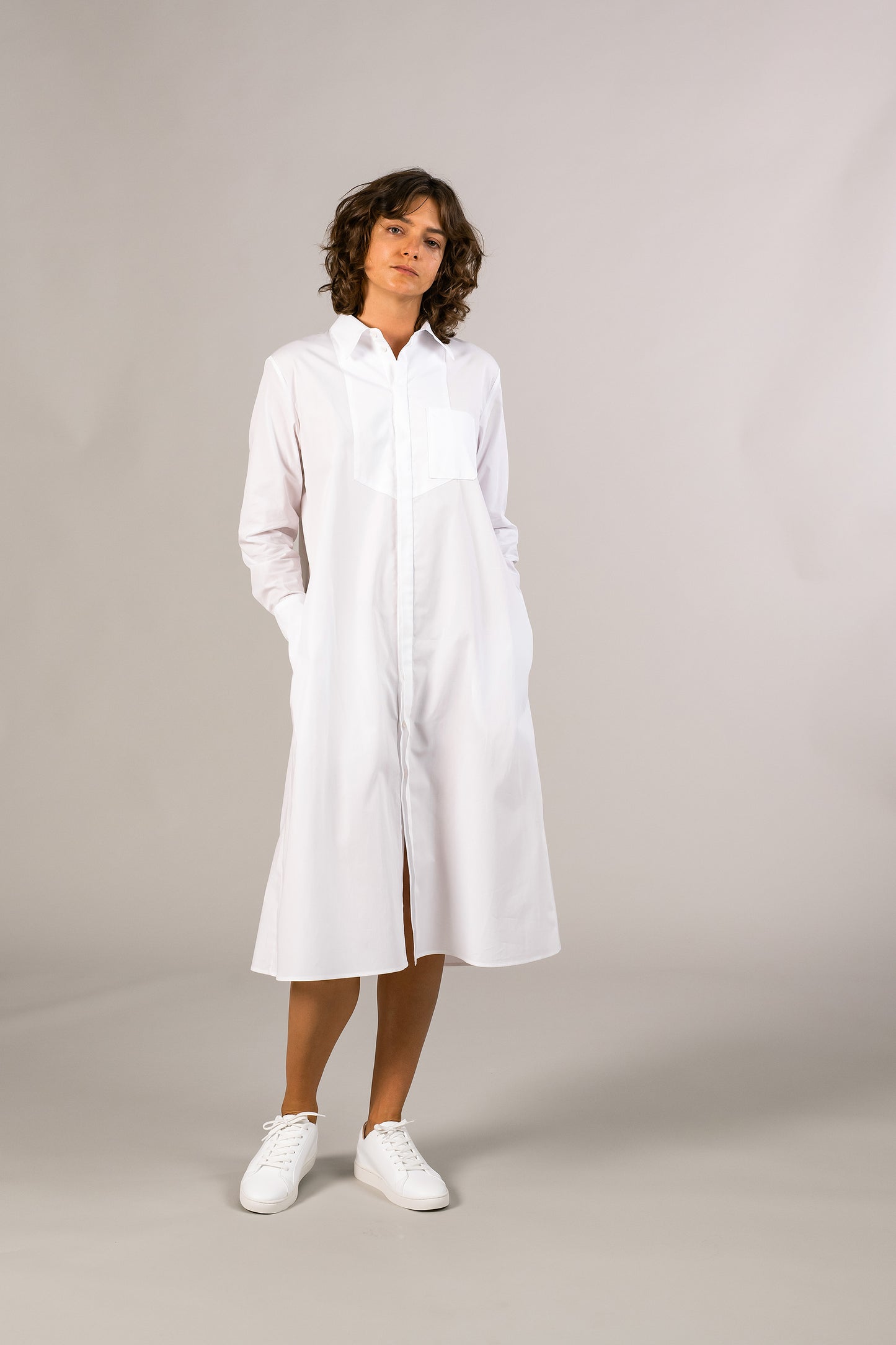 Womens white tuxedo shirt dress, 100% sustainable cotton poplin from Italy, long sleeve, button down knee length, with pockets.