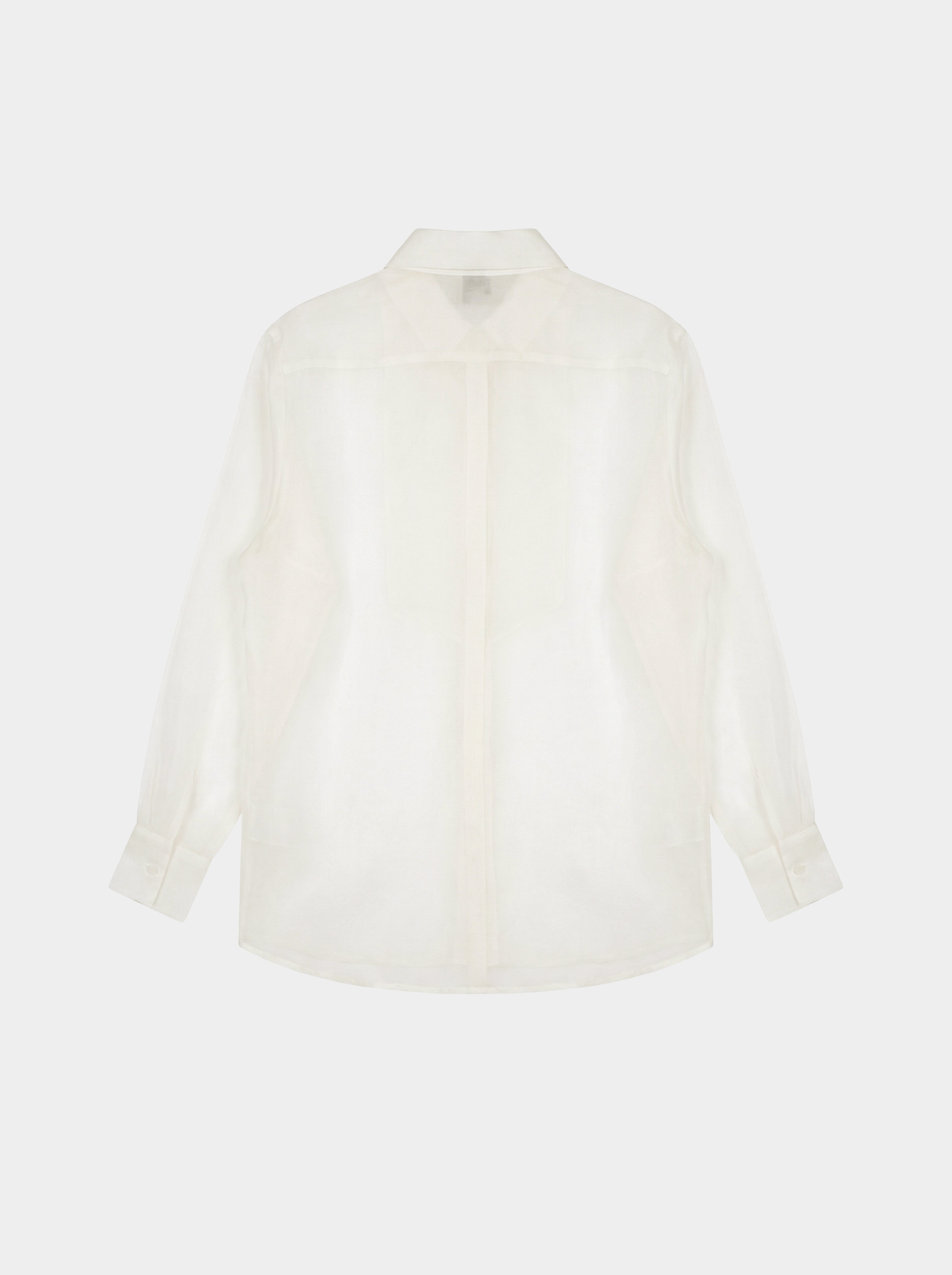 creme white shirt on a light beige background back view