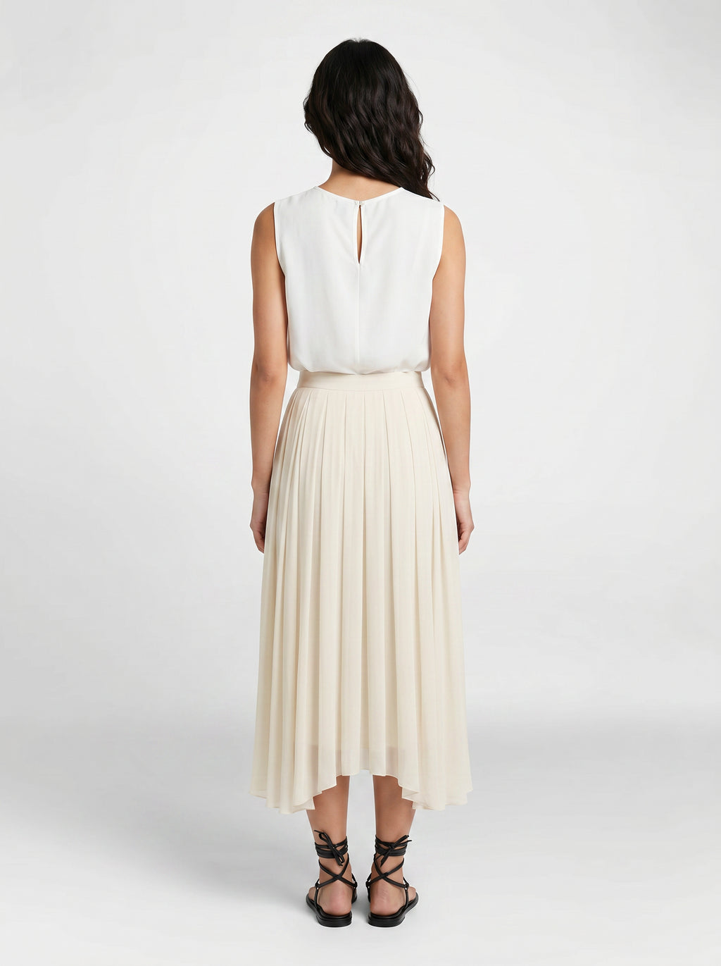 creme pleated organic silk skirt on model back view