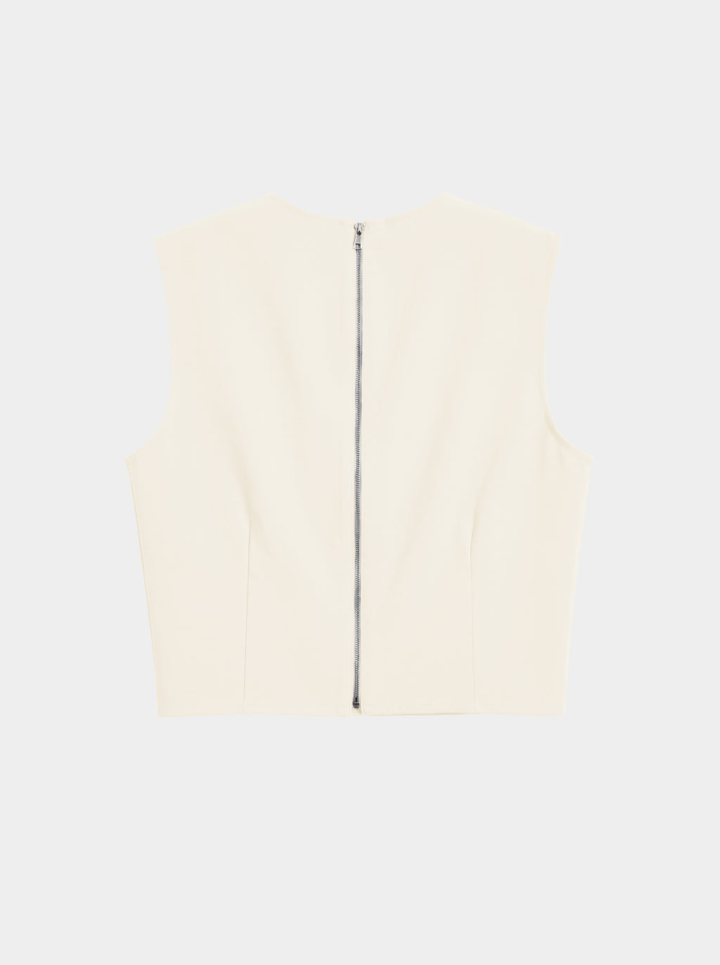 creme color Wool bodice top with silk pleated skirt on model back view