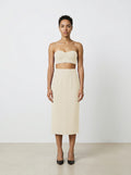 Creme wool pencil skirt on model with white background