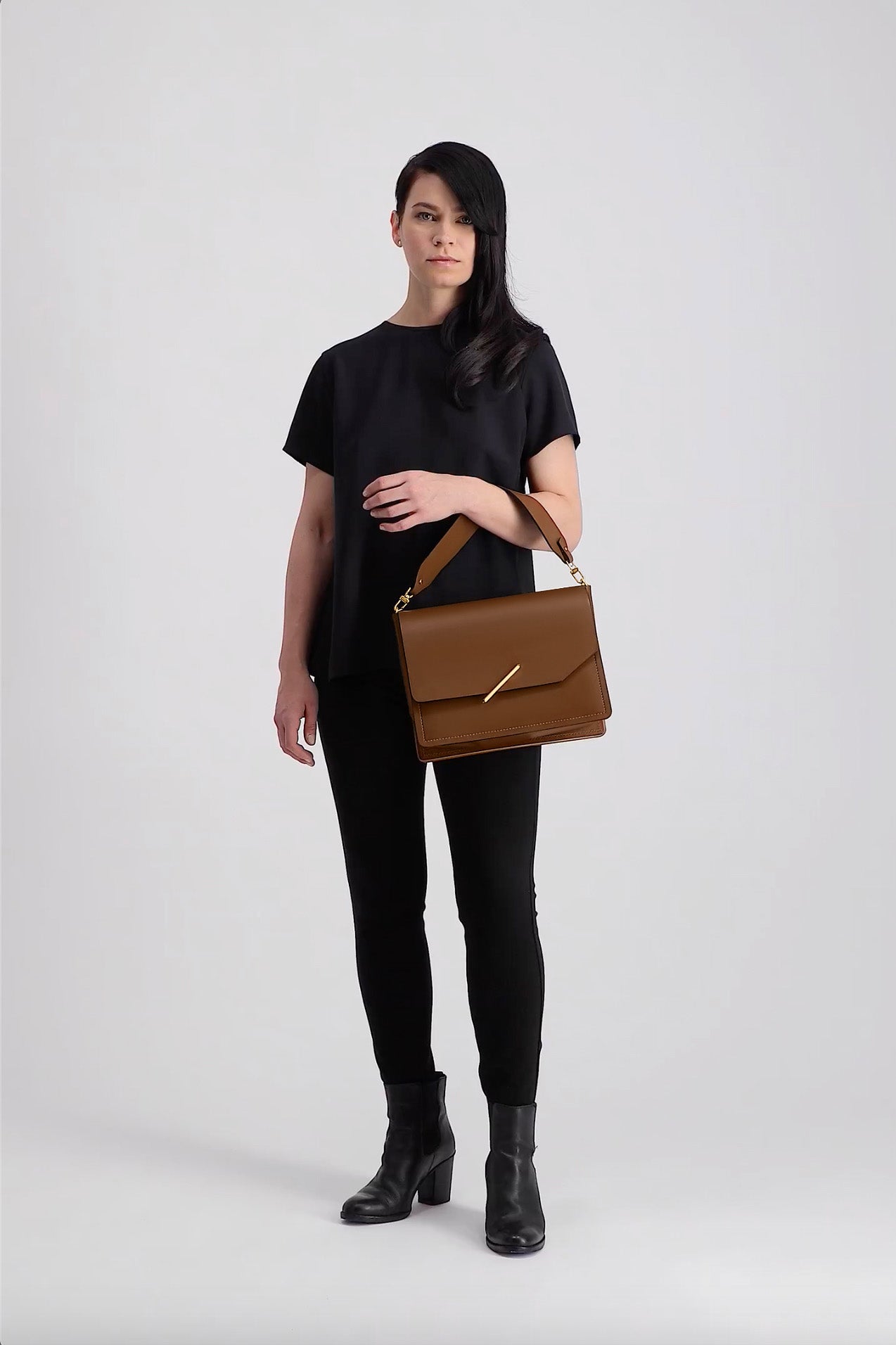 Novae Res Jemison Major Leather Handbag made with Brown Leather and Gold Hardware with Short Strap On Model