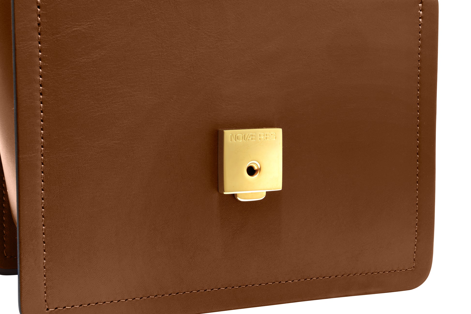 Novae Res Jemison Minor Leather Handbag made in Brown Leather and Gold Hardware with Wide Long Strap Inside Lock View