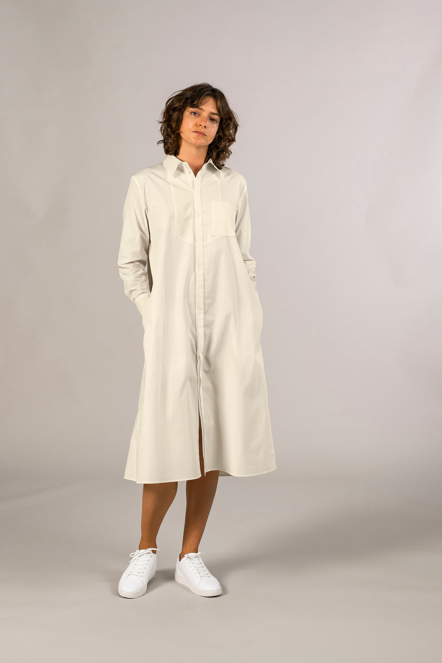 Womens cream tuxedo shirt dress, 100% sustainable cotton poplin from Italy, long sleeve, button down knee length, with pockets.